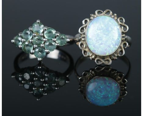 Two silver rings including cluster example from The Genuine Gemstone Company. Both stamped 925.  