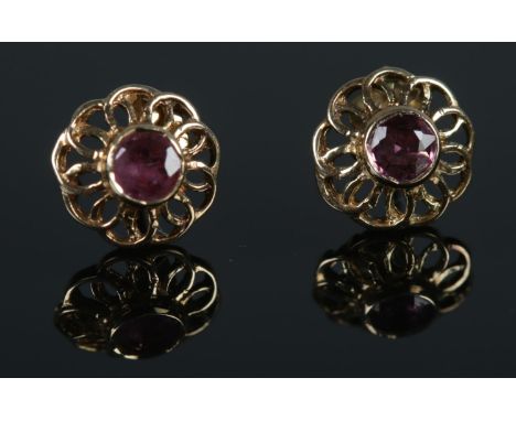 A pair of 9ct Gold ruby stud earrings.  