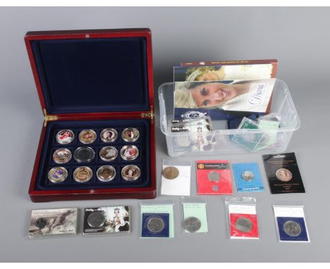 A quantity of commemorative coins including WWI Kings Shilling, Silver Jubilee Crown, Kennedy Space Center, etc.  