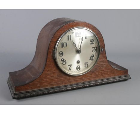 A mahogany cased dome top mantel clock. The movement marked for Haller.  