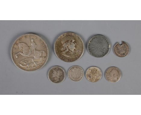 A quantity of silver coins including 1935 crown, 1953 half dollar, several three pences, etc.  