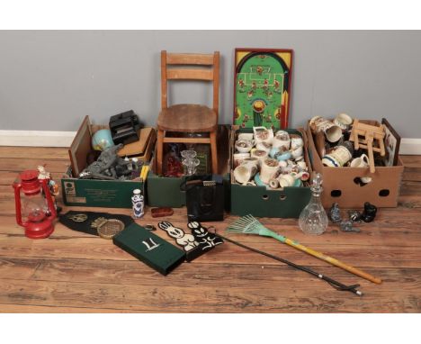 Four boxes of miscellaneous. Including Soccatelle board, tilley lamp, spelter Marley horse (AF), empty jewellery boxes, Emma 