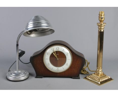 A Smiths mantel clock, along with two lamps. Includes vintage aluminium lamp and brass column example.  