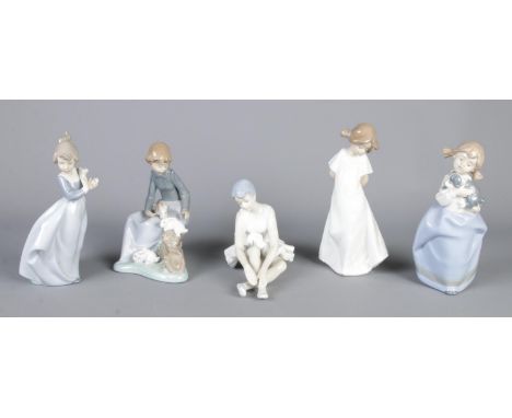 Five NAO by Lladro and similar style figures. To include ballerina and cuddling dog example.  Repairs to four of the figures;