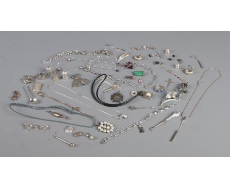 A large quantity of silver items, to include Thomas Sabo bracelet, silver thimbles, pendants, brooches etc. Total weight: 244