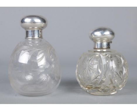 Two silver topped globular scent bottles; one stamped for Birmingham, 1938, by Mappin and Webb (10292), the other for London,