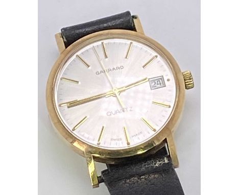 VINTAGE 9CT GOLD CASED GARRARD QUARTZ CALENDAR PRESENTATION WRISTWATCH - in original box, inscription to the case back reads 