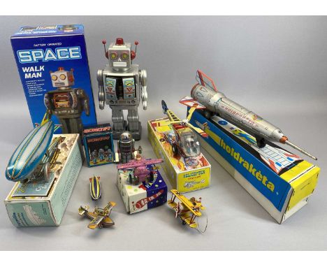 PLANES, ZEPPELINS, ROCKETS &amp; ROBOTS TIN PLATE TOYS - to include a battery operated Space Walk man robot, 30cms H, small c