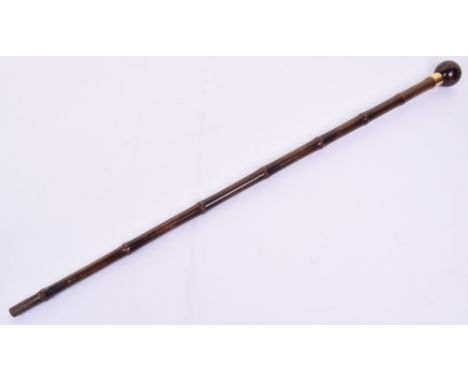 Gentleman’s Walking Stick, 18k gold ferule with polished wooden shaft and polished ball top. Missing bottom tip. Measures 79c