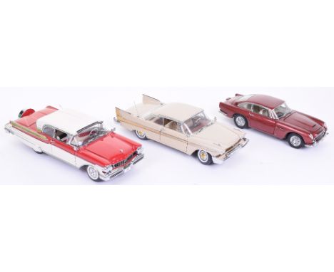 Three Danbury Mint Cars, including: 1957 Mercury Turnpike Cruiser,red/white body, 1958 Plymouth Fury, cream body (aerial loos