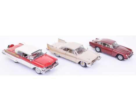 Three Danbury Mint Cars, including: 1957 Mercury Turnpike Cruiser,red/white body, 1958 Plymouth Fury, cream body (aerial loos