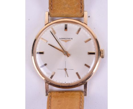 Gentleman’s Longines Manual Wind Gold Wristwatch, enamel Swiss made dial with original hands and subsidiary seconds dial. Com