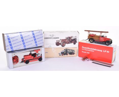 Three Conrad (Germany) Fire Engine Models, 1019 American Lafrance, 1025 Dennis LCC Fire Engine, 1027 Man Oldtimer fire engine