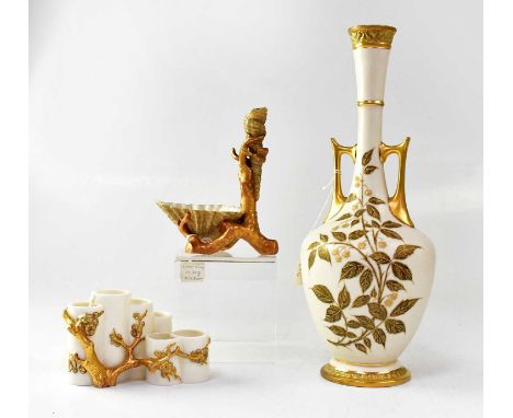ROYAL WORCESTER; four items, comprising a circa 1884 ivory ground vase with gilt bramble decoration, no. 350, height 33cm, a 