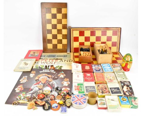 Two vintage chess sets, Russian doll, various playing cards, novelty keyrings, and two books 'The Tale of Johnny Town Mouse' 