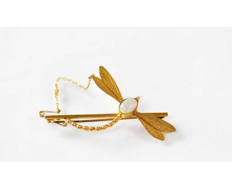 A 9ct gold bar brooch in the form of a dragonfly with bezel set oval blue/green opal cabochon, length 6cm, approx. 5.5g.