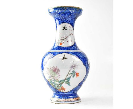 A Chinese blue and white ground vase, with panels of flora and birds, with red seal mark to base, height 32cm (af).Condition 