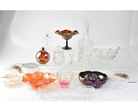A quantity of glass to include plates, bowls, decanters, cut glass rose bowls, cut glass miniature mantel clock, candlesticks