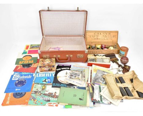 A collectors' lot to include a sprung corkscrew and toffee hammer, cricket ball, hair clippers, Toronto Canada money bank, op