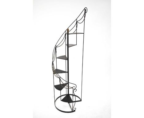 A wrought iron faux spiral staircase planter, height 163cm.