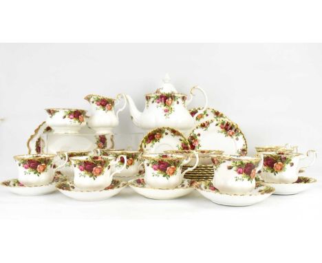 ROYAL ALBERT; an approximately thirty-seven piece 'Old Country Roses' pattern tea service, comprising teapot, milk, sugar bow