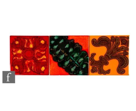 Three 20th Century Carter Tiles (Poole Pottery) 6 inch dust pressed tiles, including a Delphis colour range tile with abstrac