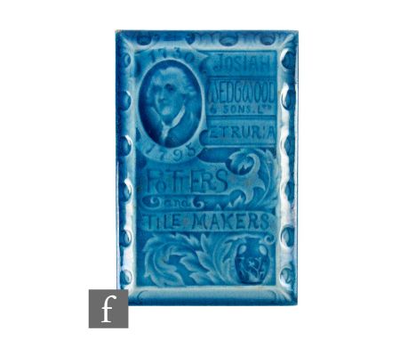 A Wedgwood rectangular tile relief decorated with a portrait of Josiah Wedgwood and an image of a vase, with the words Josiah