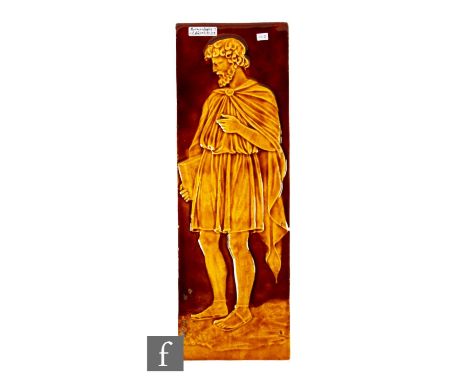 A large 19th Century 6 inch by 18 inch plastic clay tile panel attributed to Burmantofts, modelled in relief with a male Roma