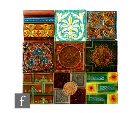 An assorted collection of 19th and 20th Century 6 inch dust pressed tiles, makers to include Garter &amp; Co, Minton Hollins 