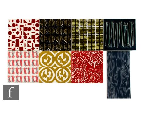 An assorted collection of 20th Century Carter Tiles 4 inch dust pressed tiles, each decorated with printed stylised and repea