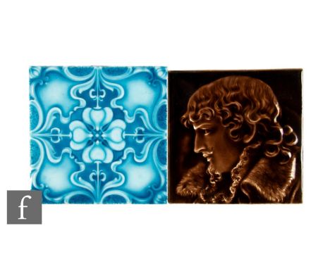 Two 19th Century J &amp; W Wade &amp; Co of Flaxman Tile Works 6 inch dust pressed tiles, an embossed decoration brown glazed