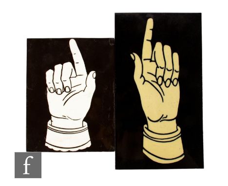 A Minton &amp; Co encaustic black clay tile of rectangle form, decorated with a Victorian style white pointing finger over a 
