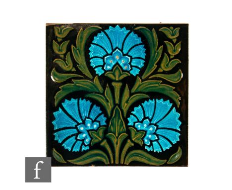 A 19th Century Maw &amp; Co 6 inch dust pressed tile, embossed design, blue and buff over black ground, stylised cornflower f