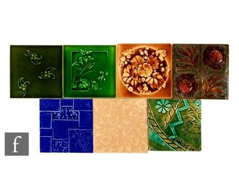 A collection of 19th Century 6 inch embossed floral tiles to include a plastic clay tile, designed by Bronyn Williams Ellis, 