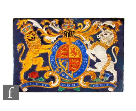 A large early 20th Century plastic clay architectural tile panel, tube line decorated with the British Royal Coat of Arms dep