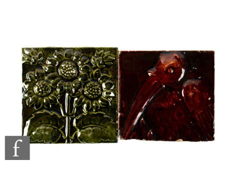 A late 19th Century Burmantoft's Pottery plastic clay 4 inch tile, circa 1890, decorated in relief with a grotesque bird in a