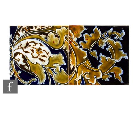 A 19th Century 6 inch stoneware two tile run, in the Doulton Lambeth style, tube lined floral and foliate scroll decoration, 