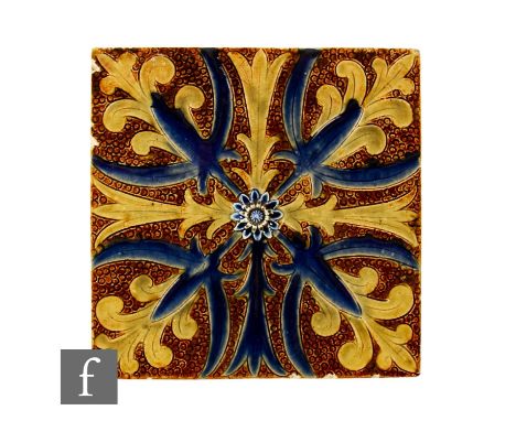 A 19th Century Doulton Lambeth 8 inch plastic clay tile, incised stylised foliate decoration and relief moulded foliate round