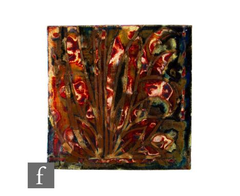 A Pilkington's Lancastrian plastic clay 6 inch tile, polychrome lustre glaze over relief moulded ground, combed back and impr