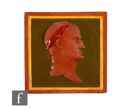 A 19th Century Maw &amp; Co terracotta dust pressed portrait tile, moulded in high relief with the head of a Roman, olive gre