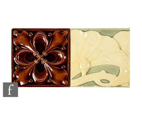 An early 20th Century Burmantofts 6 inch dust pressed tile, with a heavy relief repeat fleur-de-lis moulded decoration all in