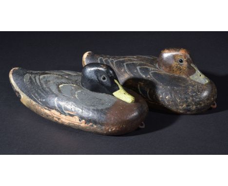 *Duck decoys. Two painted decoys, early 20th century, two carved wooden decoys with crude contemporary hand colouring, cerami
