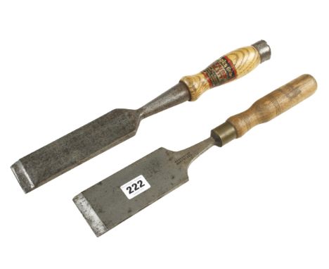 A 2" tapered socket chisel by BRADES and another 2 1/2" by RIDGEWAY G 