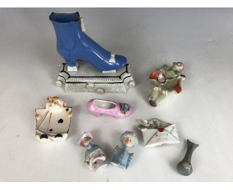 19th Century and later ceramic novelty ornaments including pin cushion ladies and a Victorian lady's boot