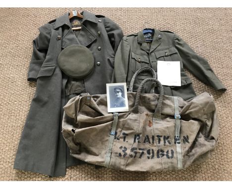 A Second World War Army Education Corps officer's uniform comprising Service Dress tunic, greatcoat, cap, kit-bag, release pa