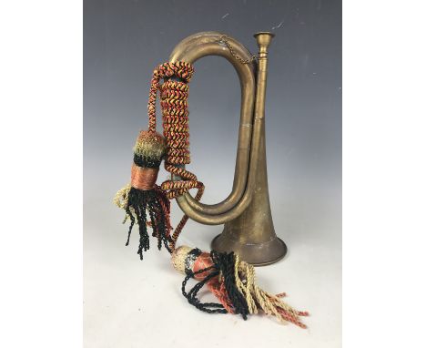 A vintage brass bugle