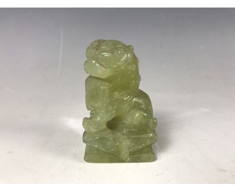 A diminutive Chinese jade temple lion