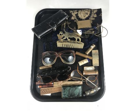 Vintage costume accessories including sunglasses, a reticule, vintage lipsticks and a horn comb