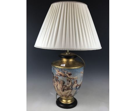 An uncommonly large urn-form table lamp and shade, gilded and decorated with a Neoclassical Bacchanalian scene, 84 cm high (i