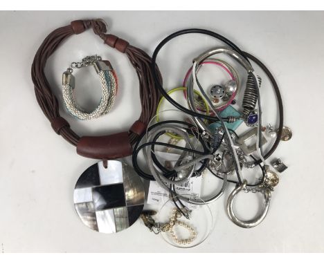 Modern costume jewellery, including artisan style bracelets, bangles and necklaces, together with a pair of white-metal stud 